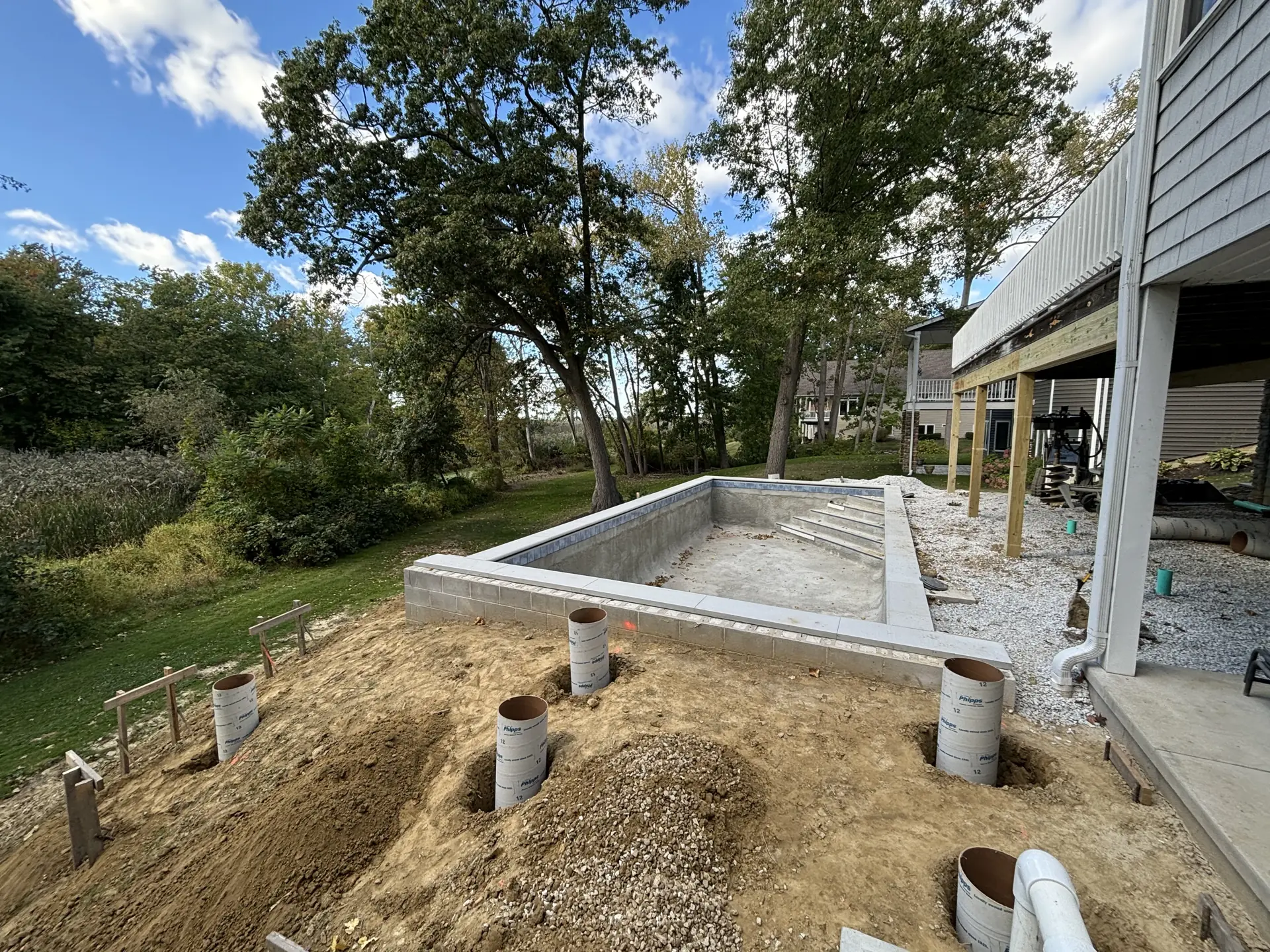 Foundation piers and pool shell